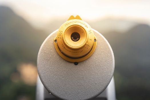 Binoculars scanning the distance, representing searching Tor hidden services with dark web search engines