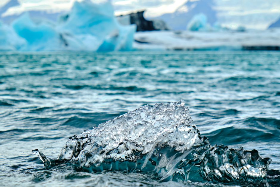 An iceberg above and below the waterline, the classic metaphor for the deep web and dark web